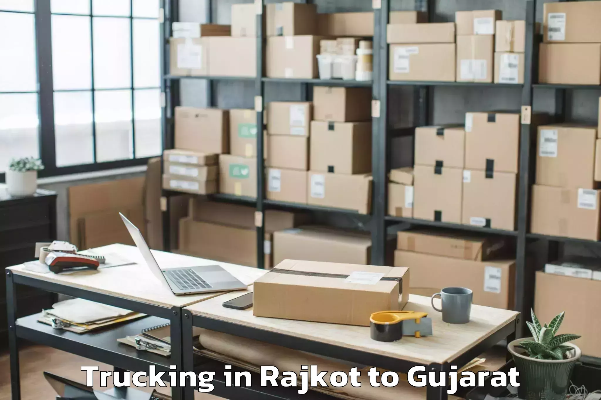 Get Rajkot to Gussar Trucking